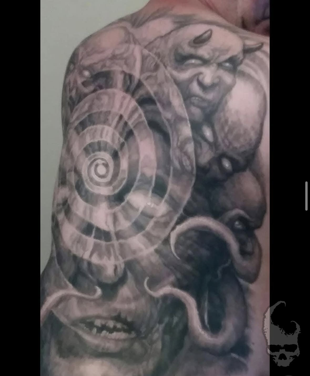 Featured Paul Booth tattoo